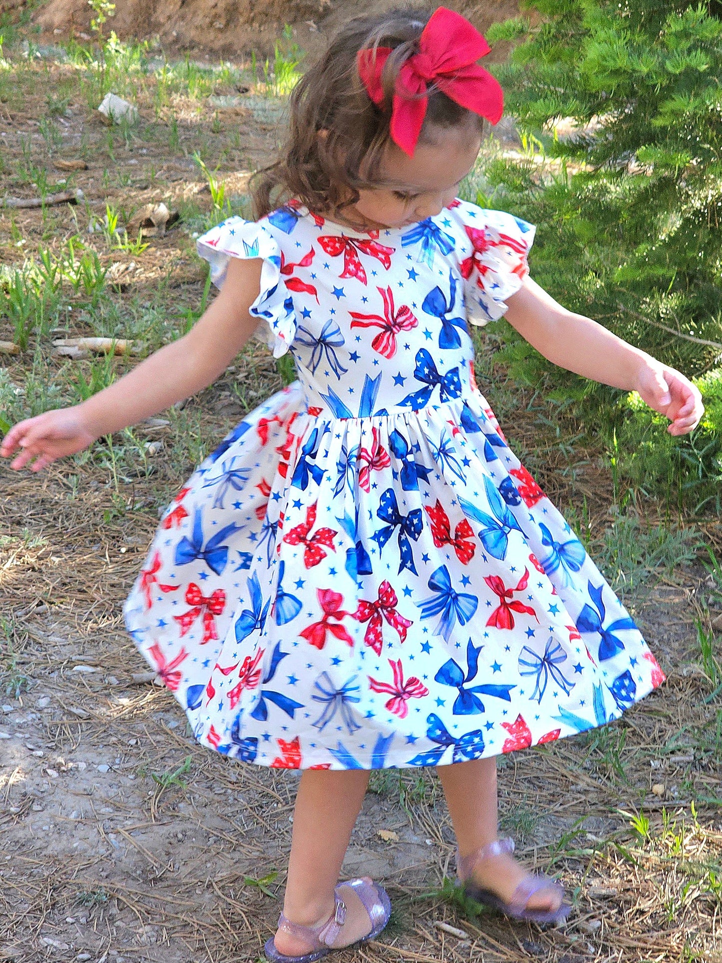 Sparkles and Bows Flutter Sleeve Twirl Dress