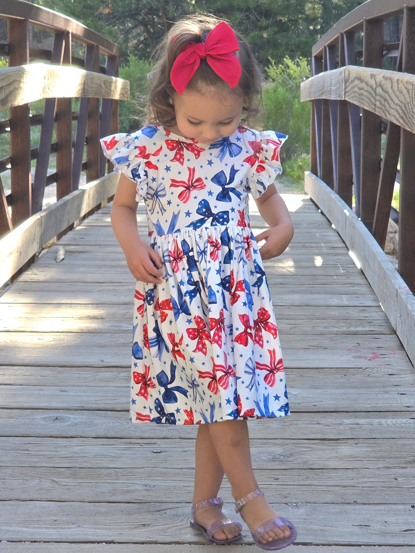 Sparkles and Bows Flutter Sleeve Twirl Dress