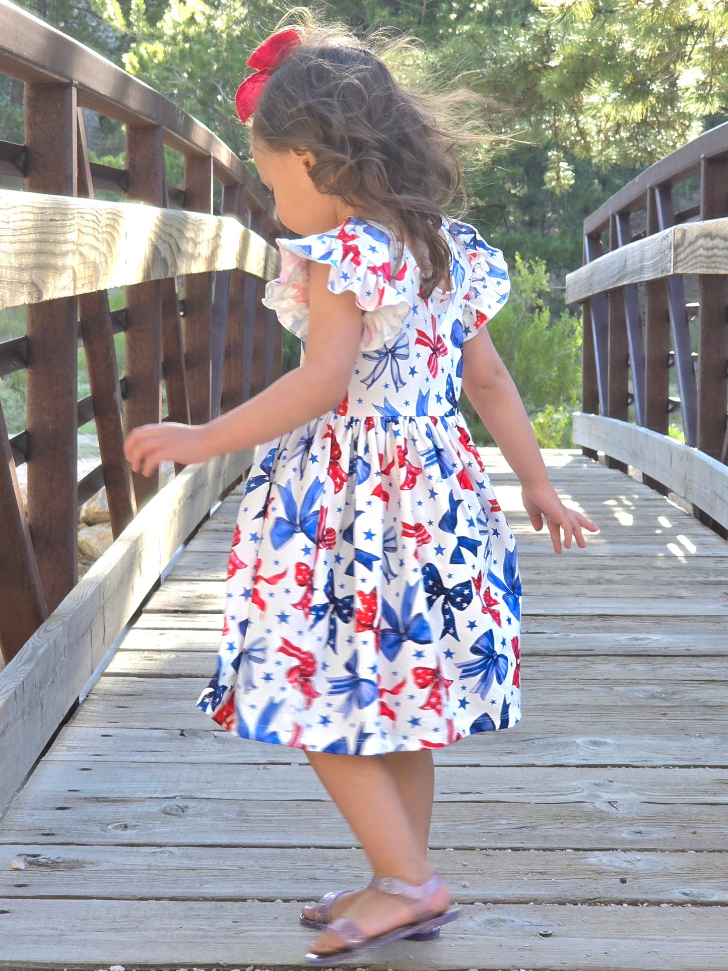 Sparkles and Bows Flutter Sleeve Twirl Dress